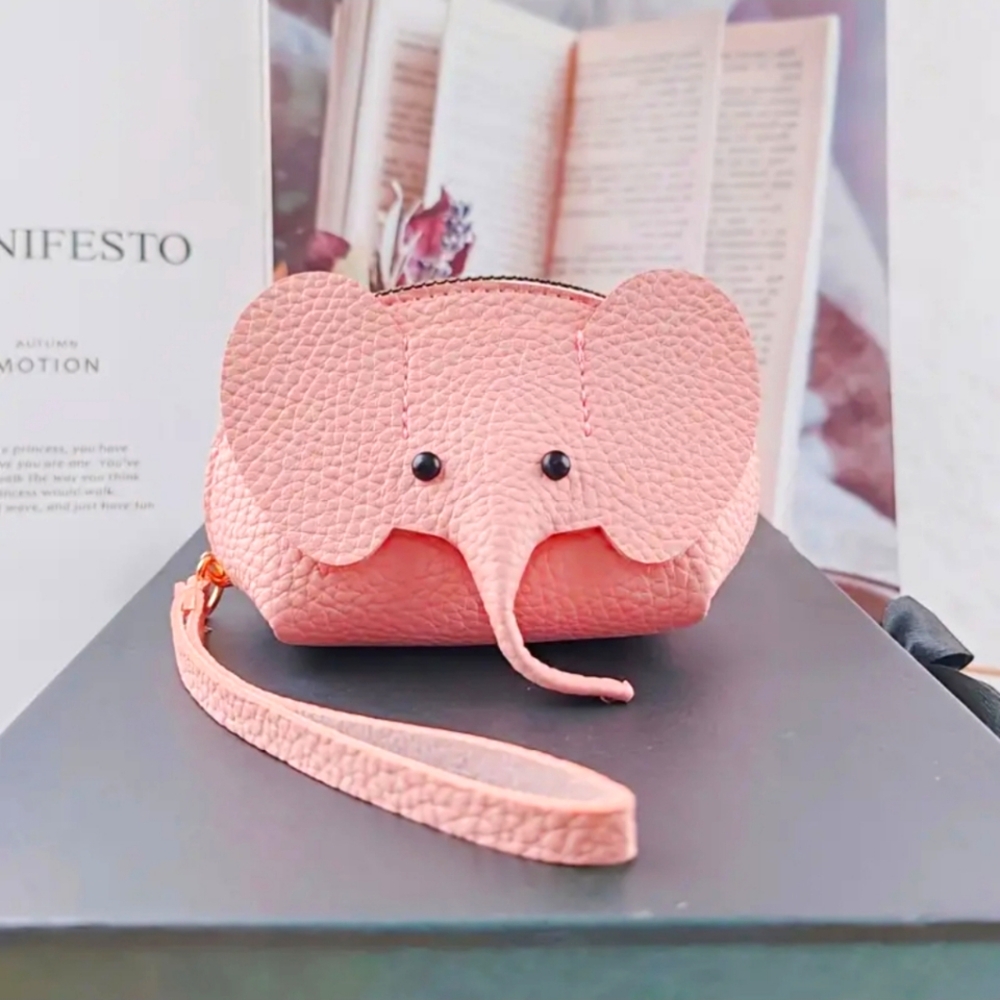 Pink Elephant wristlet is back in stock. Zipper closure - Last 1